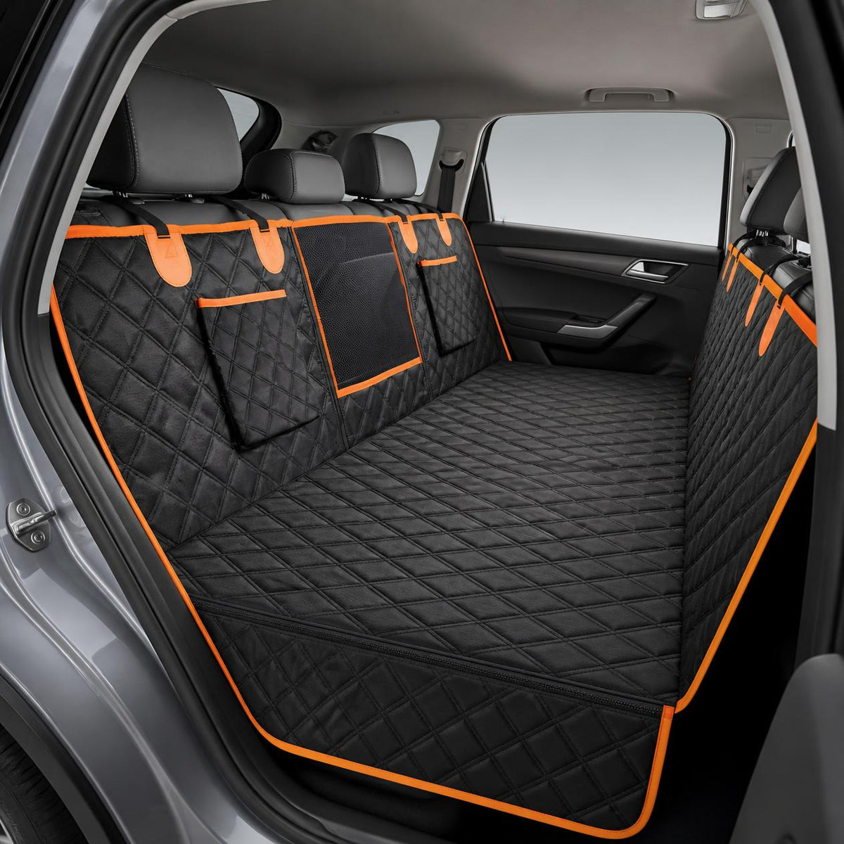TrekFold hard-bottom seat cover installed, flat platform over the rear footwell